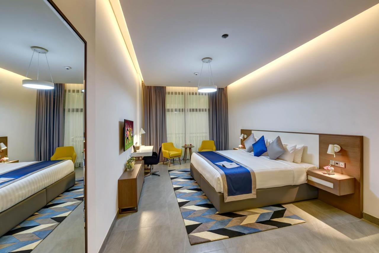 Abar Hotel Apartments Dip-1 Dubai Exteriör bild