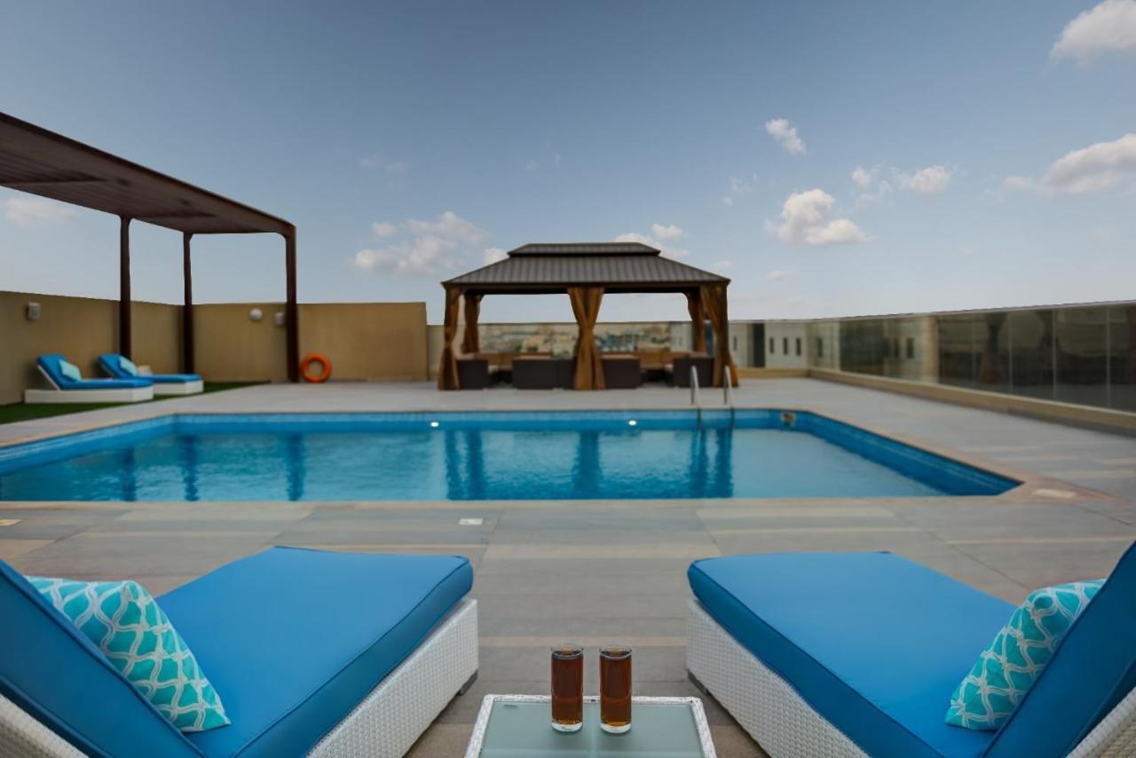 Abar Hotel Apartments Dip-1 Dubai Exteriör bild