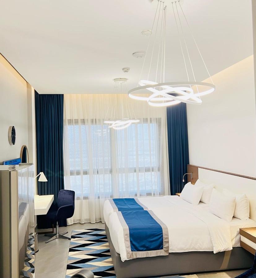Abar Hotel Apartments Dip-1 Dubai Exteriör bild